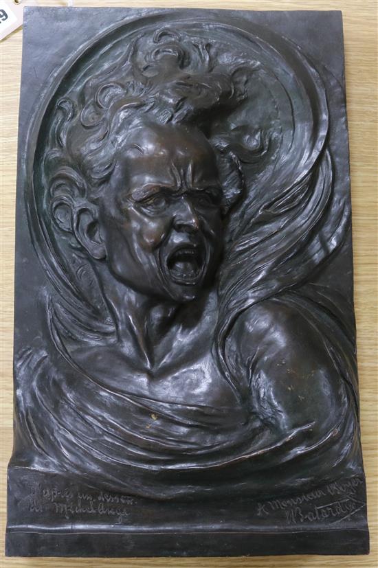 A bronze relief plaque, signed